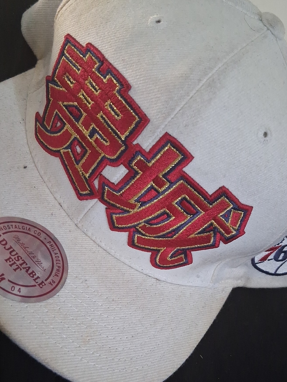 White Cny 76ers Baseball Cap with Red & Gold Embroidered Graphic